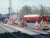 Here two cars have been put on the track and are heading for the station, while other cars are in process of being put on the track.