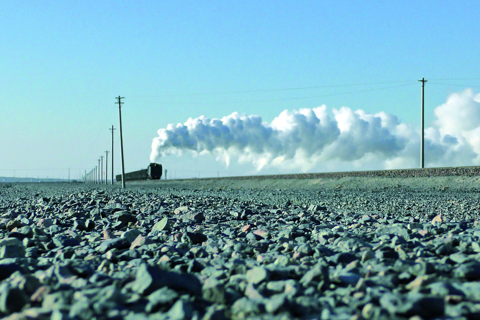 In Sandaoling endete im Juni der Einsatz von Dampfloks vor Zügen aus dem Tagebau.
